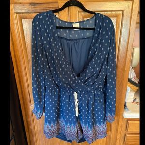 Blue Patterned Romper with Red Accents